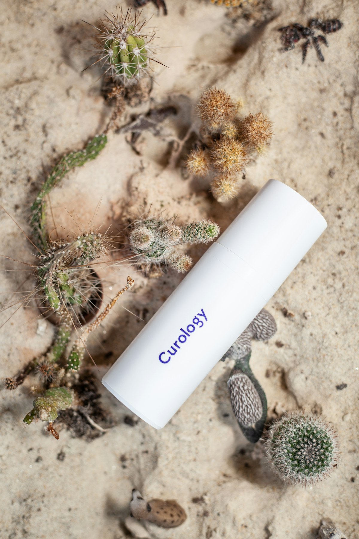Skincare product in a desert lifestyle scene
